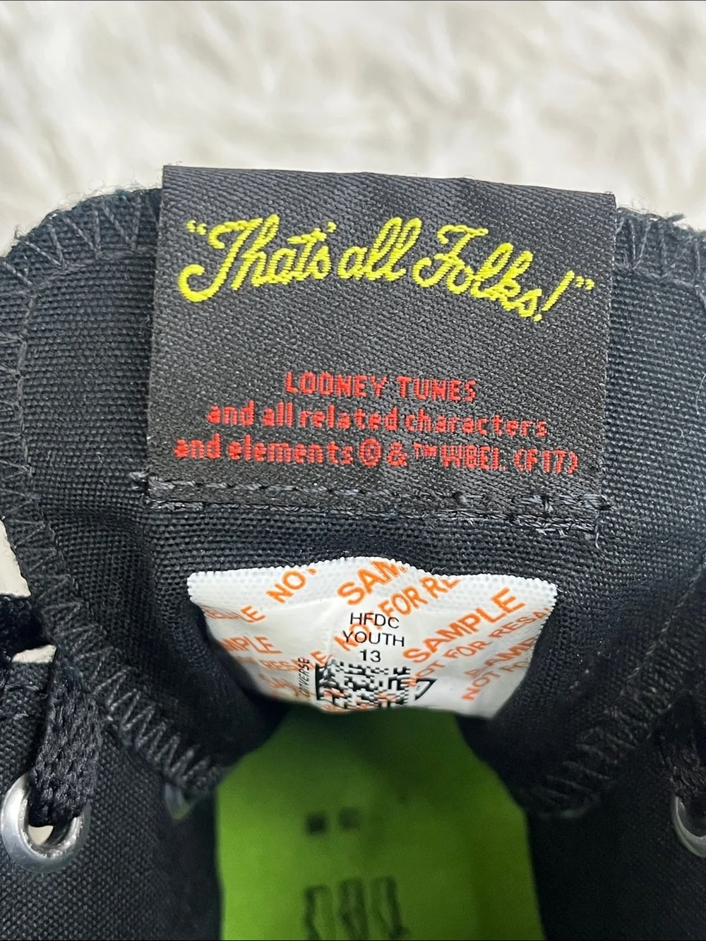 Converse Kids High-Top Sneakers in Black with Orange and Green Galaxy Accents